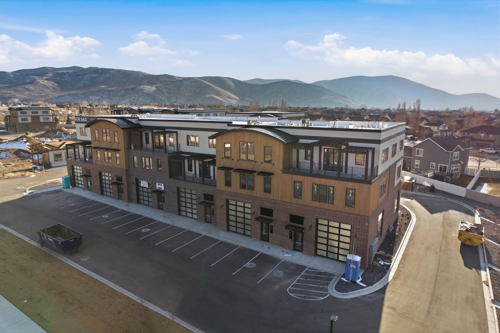Aerial drone view of a multi-building commercial development built by Bell Mountain Builders